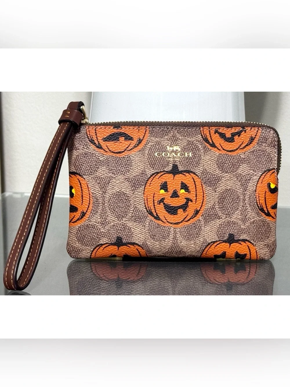 COACH Corner Zip Wristlet In Signature Canvas With PUMPKIN HALLOWEEN PRINT